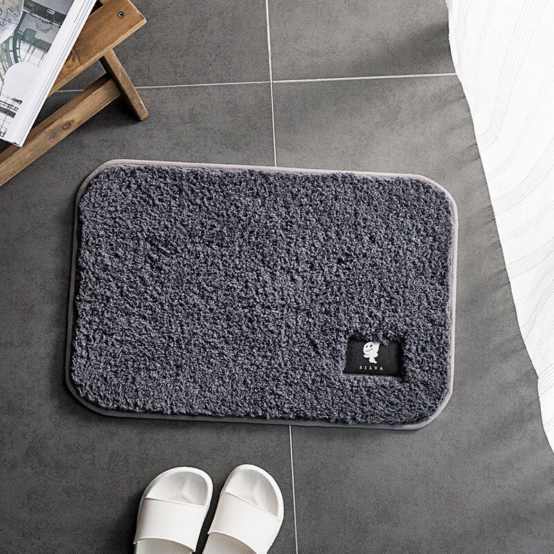 Bathroom toilet door absorbent floor mat